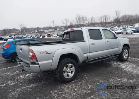 2009 Toyota Tacoma Base V6 из США, поврежденный, VIN 3TMMU52NX9M015434